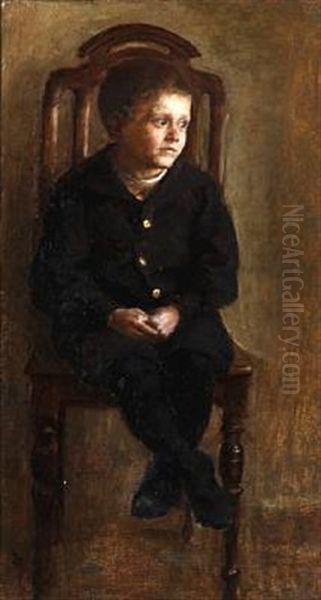 A Boy Sitting On A Chair - view 1