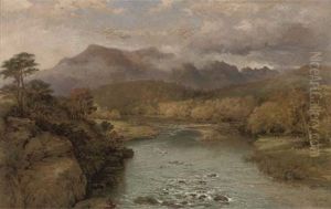 A Winding River With Hills Beyond