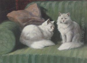 Two Persian Cats On A Green Sofa by Arthur Heyer