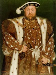 Portrait Of King Henry Viii In An Ermine-lined Brocaded Cloak, Holding A Pair Of Gloves In His Right Hand.