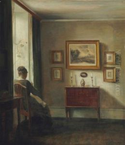 Interior With The Artist's Wife Sewing By A Window by Carl Vilhelm Holsoe