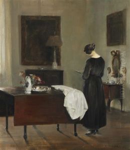 The Painter's Wife In Their Home Reading A Book by Carl Vilhelm Holsoe