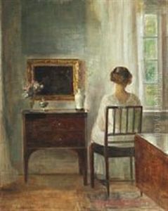 Interior With A Young Woman By The Window by Carl Vilhelm Holsoe
