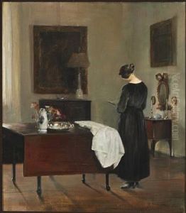 The Painter's Wife Reading In A Corner In The Living Room by Carl Vilhelm Holsoe