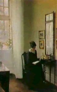 Interior Med Kunstnerens Hustru Laesende Med Ryggen Mod Vinduet Foran Et Spejl Med Konsol by Carl Vilhelm Holsoe