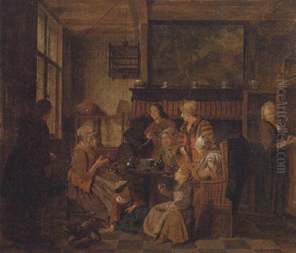 A Family Drinking Tea At A Table In An Interior - view 1