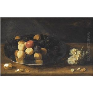 A Still Life With Plums On A Silver Tazza, Together With Grapes And A Walnut, All On A Wooden Table