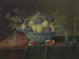 Plums And Grapes In A Porcelain Bowl, With Slices Of A Pomegranate And Grapes On A Partially Draped, Wooden Table by Jacob van Hulsdonck