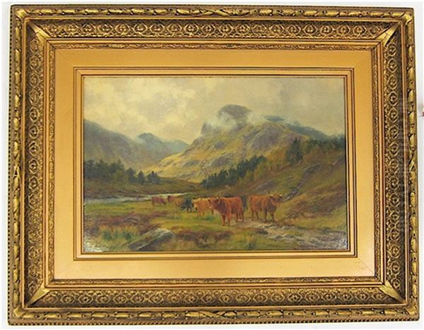 Highland Cattle Grazing In A Mountain Landscape - view 1
