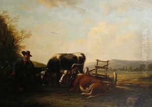 A Farmer With Oxen Resting Beside A Cart