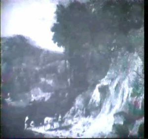 A Wooded River Landscape With Bathers By A Sandy Bank by Jan Baptiste Huysmans
