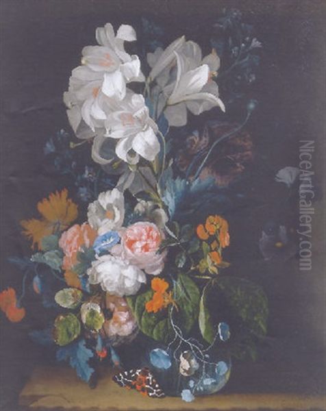 Lilies, Roses, Carnations And Other Flowers In A Glass Vase On A Stone Ledge With A Butterfly - view 1