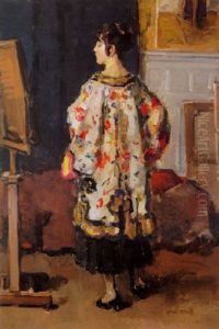 A Lady In A Kimono In Front Of A Mirror by Isaac Lazarus Israels