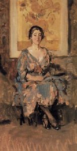 A Lady Seated In Front Of Vincent Van Gogh's Sunflowers by Isaac Lazarus Israels