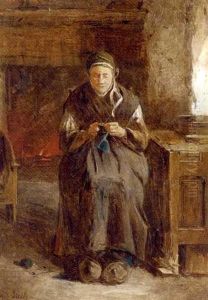 A Woman Knitting By The Fire