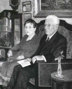 Aegteparret Anna Og Peter Duus Siddende I En Sofa by Rudolph Jacobsen