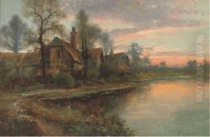 A Thatched House Beside A Lake At Sunset by Francis E. Jamieson