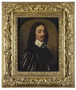 Half Length Portrait Of A Young Man In Striped Doublet by Cornelis Jonson Van Ceulen