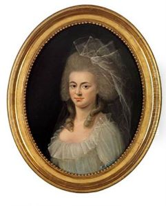 A Young Woman With A Veil In Her Hair And A White Dress