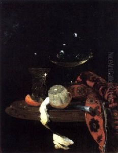 A Still Life Of A Wine Glass, A Roemer, A Partly Peeled Lemon, And A Knife On A Table, Partly Draped With A Carpet by Willem Kalf