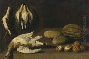 Still Life Of Dead Game Birds, Gherkins, A Melon And Walnuts All On A Wooden Table