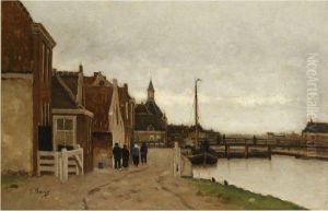 A Dutch Townview With Figures Along A Canal