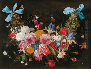 A Floral Garland Held By Blue Bows