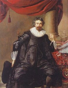 Portrait Of A Gentleman Seated By A Table, Wearing Black Costume With Lace Collar And Cuffs, Holding A Hat In His Right Hand by Thomas De Keyser