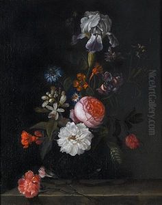 Roses, An Iris, Carnations And Other Flowers In A Glass Vase On A Stone Ledge