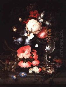 A Still Life Of Roses, Hibiscus, Convolvulus And Other Flowers In A Glass Vase On A Stone Ledge With Grapes, A Bird's Nest And A Robin