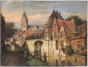 An Angler Beside A Canal At The Edge Of A Town