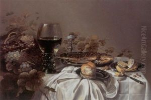 Still Life Of A Fish, Bread, A Peeled Lemon, Grapes In A Basket, A Salt And Roemer, All On A Draped Table by Roelof Koets the Elder
