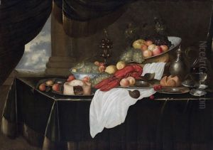 A 'pronkstilleven": A Sumptuous Still Life Of A Lobster, A Pie And Various Fruits In Blue And White Bowls And On Pewter Plates, Together With A Basket Of Bread, A Wine Glass, A Gilt Goblet, A Pewter Flagon, Oysters And A Fig On A Table Draped With A Red V by Andries De Koninck