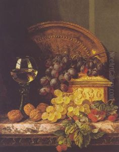 Still Life With Grapes, Walnuts And A Wine Glass On A Marble Ledge by Edward Ladell