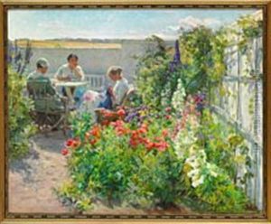 Summer Day With Flowers In Bloom In The Garden And Three Young Women Sewing by Knud Larsen