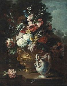 Roses, Carnations, Peonies, Hydrangeas And Other Flowers In A Bronze Urn On A Stone Ledge With Other Vases, A Landscape Beyond