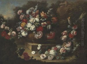 Roses, Tulips, Carnations And Other Flowers In An Urn, With Other Flowers Beside, In A Landscape by Gasparo Lopez