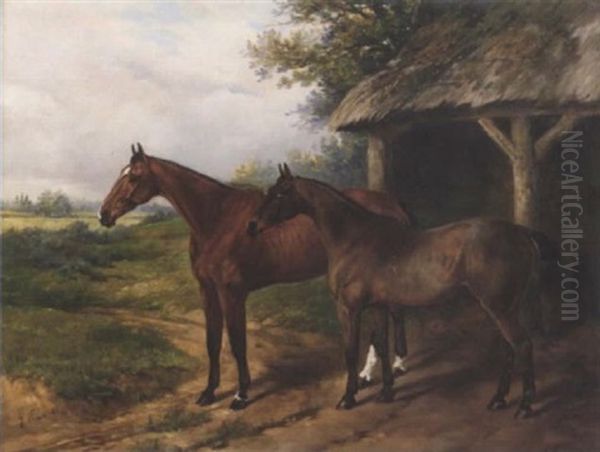 A Chestnut And A Bay Mare Outside A Thatched Stable - view 1