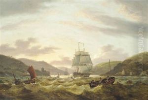 A Royal Navy Frigate Emerging From The Dart Estuary At Dusk With Dartmouth Castle Seen Off Her Stern Quarter