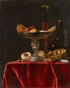 Still Life With A Silver Bowl, Fruits, A Glass And A Bottle On A Red Cloth by Simon Luttichuys