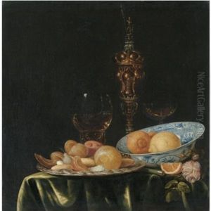 Still Life With Oranges And Lemons In A Blue And White Porcelain Dish, A Large Gold Pronckblokaal And A Silver Platter, All Arranged On A Draped Table