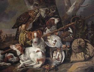 A Hunting Still Life Of Partridges With Four Springer Spaniels, A Hawk, A Game-bag And Belt And Other Hunting Gear In A Landscape by Christiaan Luycks