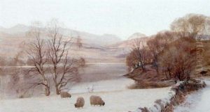 Sheep Grazing On The Banks Of A Snow Covered Loch by John Howard Lyon