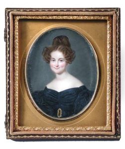 Portrait Miniature Of A Young Lady, Seated, Wearing A Dark Blue Dress With Ruffled Sleeves And Gold Belt Buckle