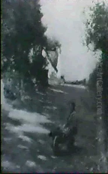 Young Boy With A Wheelbarrow In Village - view 1