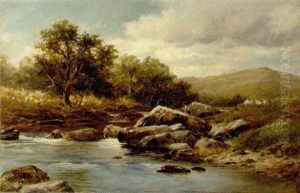An Angler On The Bank Of A Rocky River
