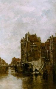 A View Of Dordrecht With A Washerwoman By A Canal by Jacob Henricus Maris