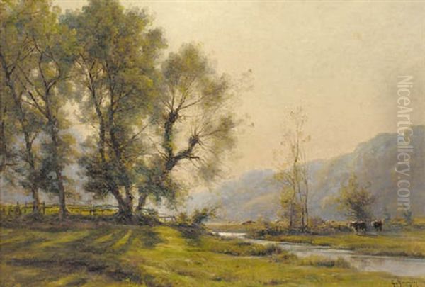 Cattle Grazing In A River Landscape - view 1