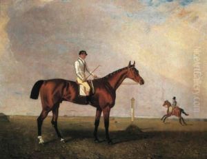 A Bay Racehorse With A Jockey Up On A Racecourse