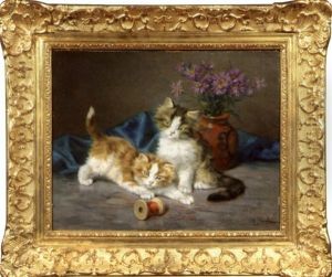 Deux Chatons Jouant Avec Une Bobine De Fil